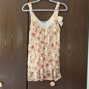 Julie’s Closet sleeveless cream colored top with red/green netting. Size Large
